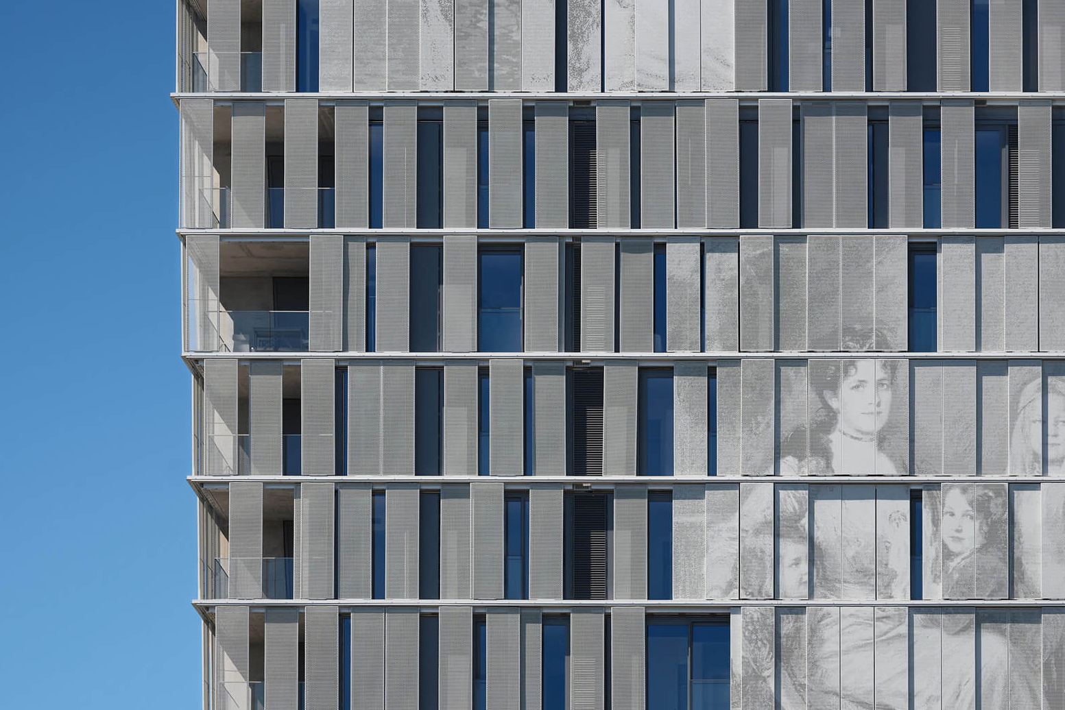 Perkins&Will shades Museum House with sliding metal panels that depict imagery from the Frye Art Museum