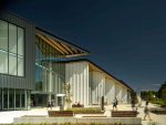 hcma encloses təməsew̓txʷ Aquatic and Community Center with standing seam metal and rigorous insulation