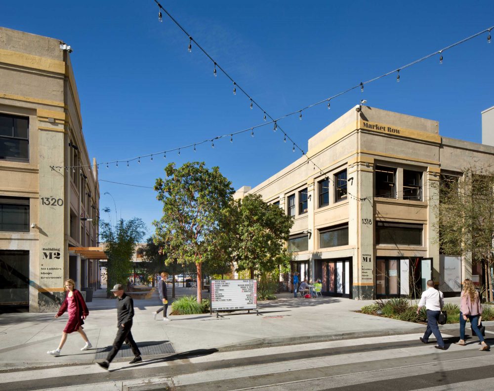 People walking in front of the ROW DTLA, a series of adapted historic buildings