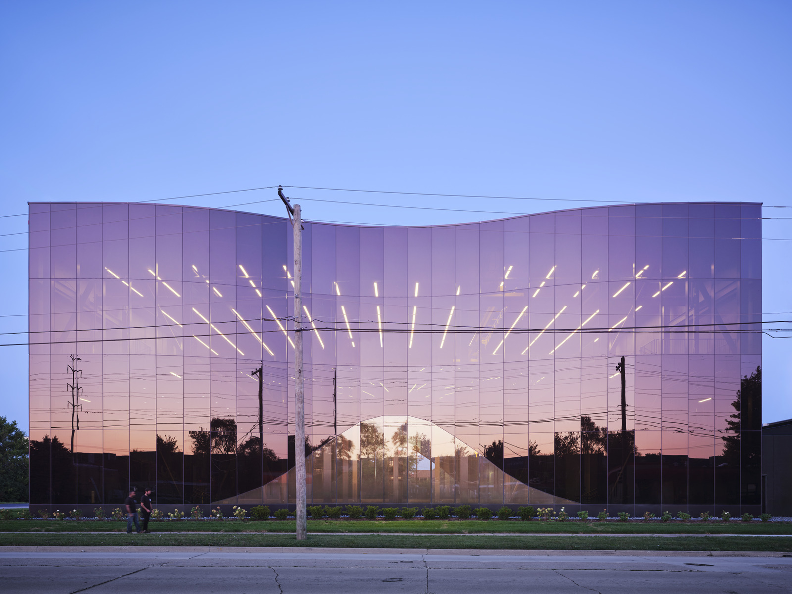 Gensler clads the Iron Workers Local 63 with an undulating curtain wall of tinted glass