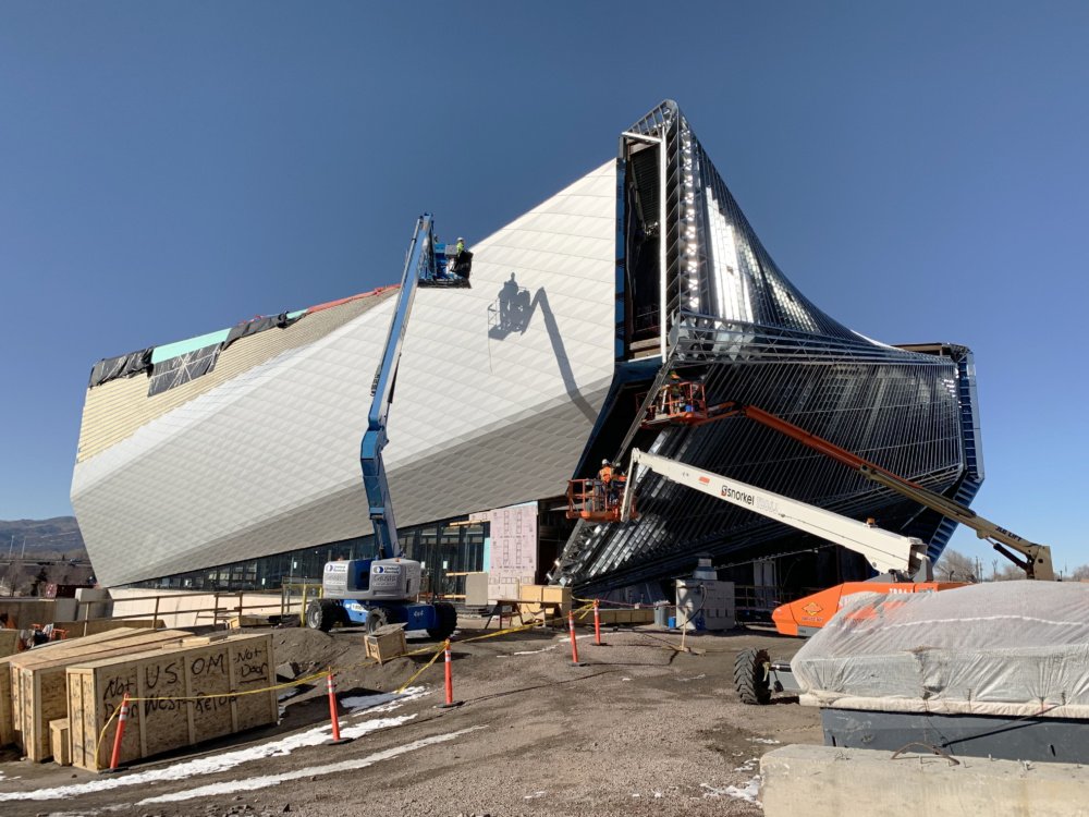 Exterior construction image of the Olympic Museum, which twists as it rises