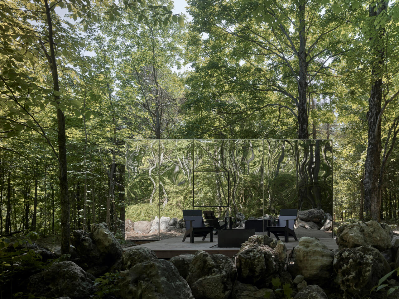 A mirrored cabin in the woods designed by Leckie Studio Architecture + Design