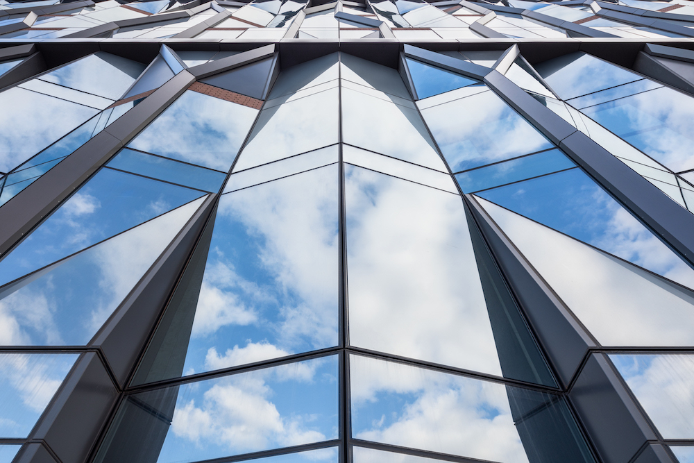 French 2D enlivens a Cambridge parking garage with a graphic-printed mesh  facade