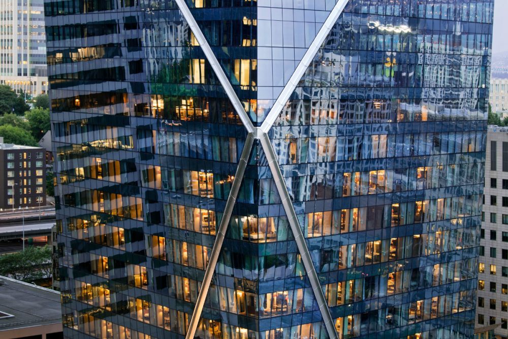An intersecting steel X on the facade of The Mark tower